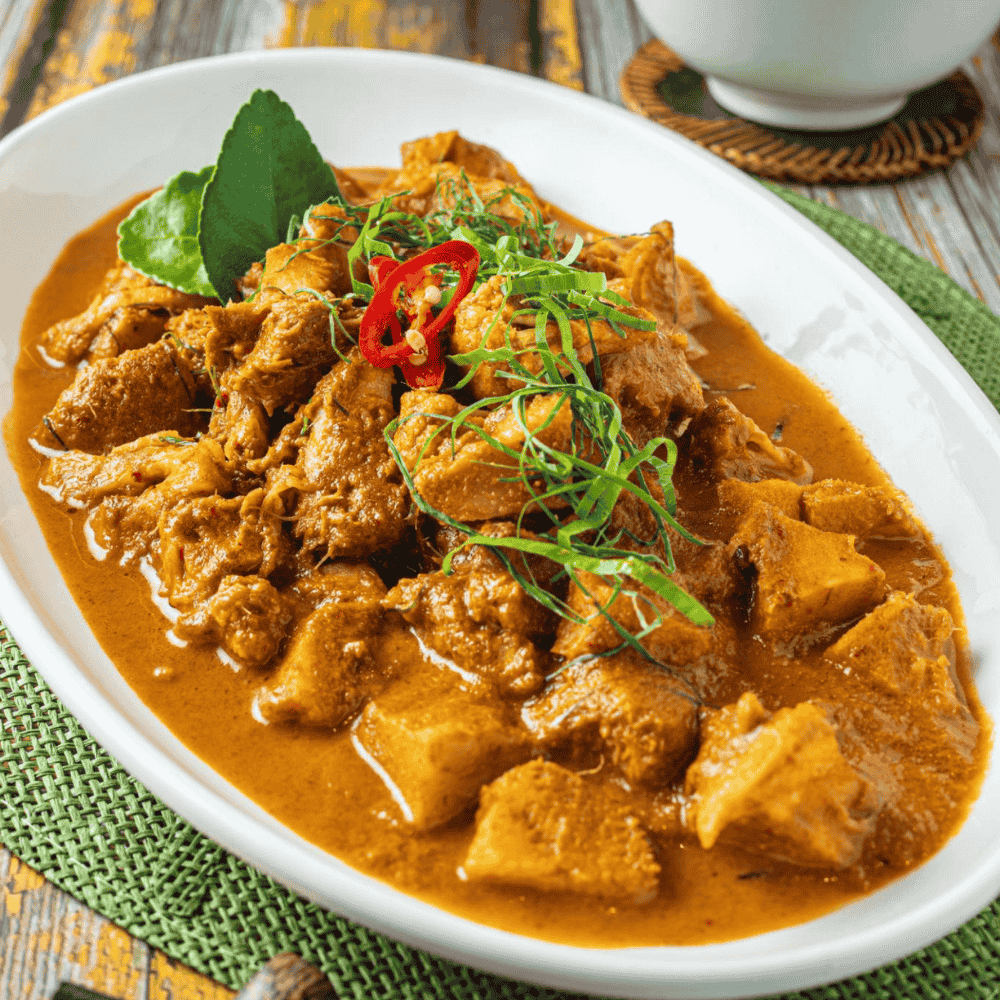 Home slow cooked vegan beef rendang with aromatic coconut gravy